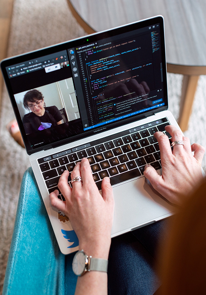 writing code on a laptop